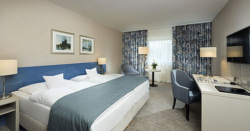 Superior Zimmer Superior Zimmer im Maritim Hotel Bonn mit stilvollem Design, gemütlichen Betten, modernem Schreibtisch und komfortabler Sitzecke